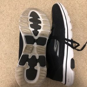 Black Go walk Skechers for women.